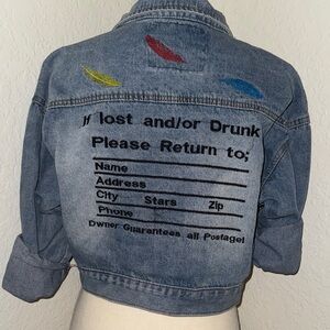 Distressed Denim Jacket with Embroidered Details